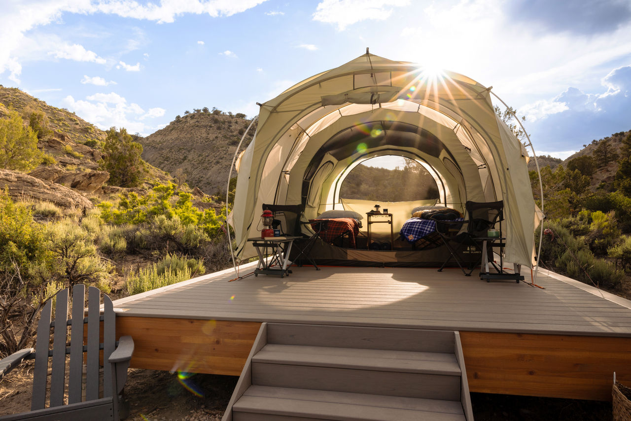 Platform tent with sleeping bags.